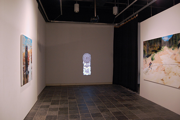 The animation projected on the wall of an art gallery, flanked by paintings